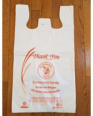 Wiederverwendbare biologisch abbaubare Plastikeinkaufstaschen gut, Eigentum mit Logos isolierend
